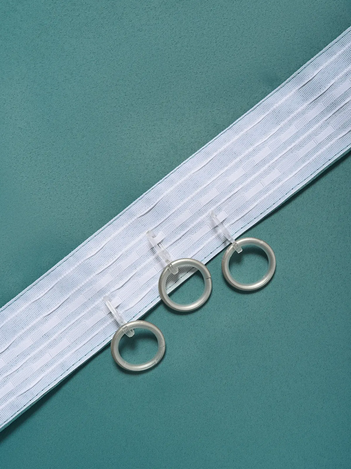 Curtain header and ring construction detail